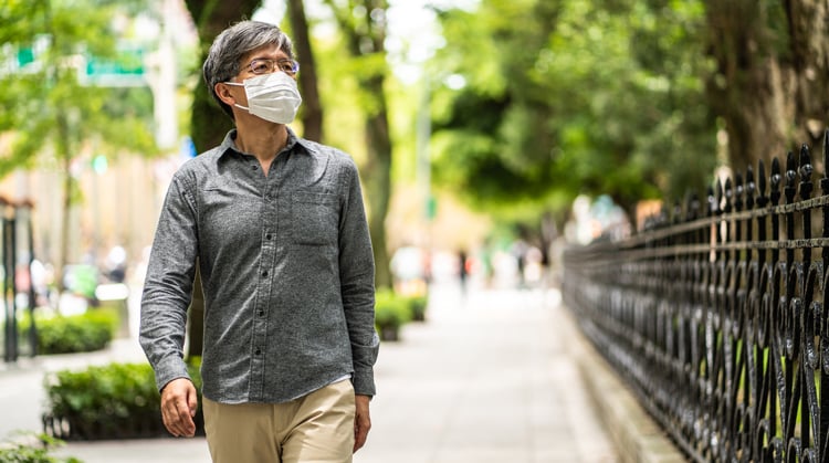 COVID-19-Man-Walking-Mask-Asian_750x419.jpg