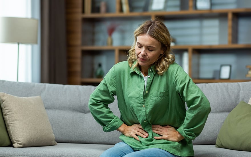 Woman-holding-stomach_880x550.jpg